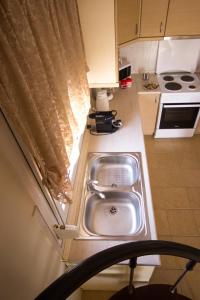 Kuchyň nebo kuchyňský kout v ubytování Stasa Luxury Apartments