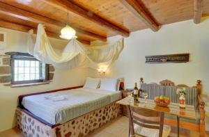 Postel nebo postele na pokoji v ubytování Elia Hotel & Spa