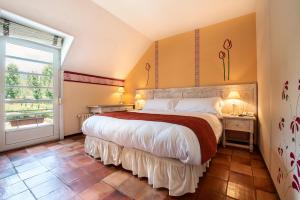Postel nebo postele na pokoji v ubytování Hotel La Posada De Alameda