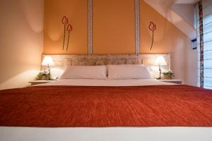 Postel nebo postele na pokoji v ubytování Hotel La Posada De Alameda