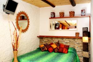 TV a/nebo společenská místnost v ubytování Solemare Accommodation Alghero