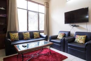 A seating area at Antilia Villa