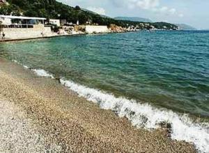 a beach with the ocean and a rocky shore at Villa Peragic in Molunat +71 photos
