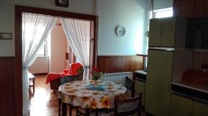 a kitchen with a table with a table cloth on it at ★Apartment Stella★ in Malija