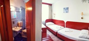 Posteľ alebo postele v izbe v ubytovaní Hotel Nap + 37 fotografií