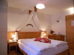 Postel nebo postele na pokoji v ubytování Hotel Salvanel