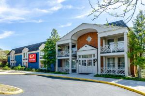 a rendering of a hotel with a building at Econo Lodge Inn & Suites Radford-Blacksburg Area in Radford