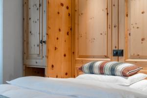 Postel nebo postele na pokoji v ubytování Boutique Hotel Cervus