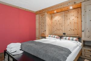 Postel nebo postele na pokoji v ubytování Boutique Hotel Cervus