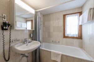 Koupelna v ubytování Boutique Hotel Cervus