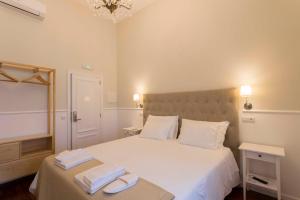 Кровать или кровати в номере Ericeira Soul Guesthouse