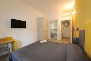 TV a/nebo společenská místnost v ubytování B&B Ariston Pisa Tower