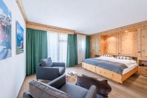Postel nebo postele na pokoji v ubytování Boutique Hotel Cervus