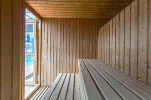 a wooden interior of a room with a window at Hotel Madeira Centro in Benidorm
