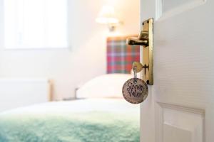 a room with a door with a key at The Dinney B&B in Bridgnorth +64 photos