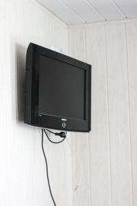 TV a/nebo společenská místnost v ubytování Rotušė
