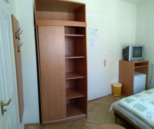 TV a/nebo společenská místnost v ubytování Siófokroom24 + 5 fotografií