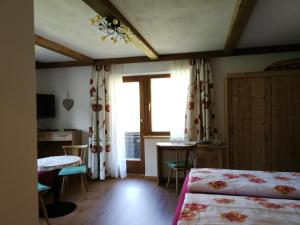 Postel nebo postele na pokoji v ubytování Haus Alpina