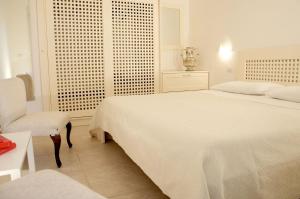 Posteľ alebo postele v izbe v ubytovaní Residence Castello Otranto