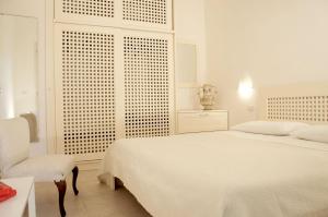 Posteľ alebo postele v izbe v ubytovaní Residence Castello Otranto