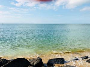a view of the ocean from a rocky beach at Garden Oasis in Margate