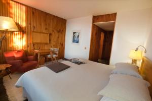 Letto o letti in una camera di Hotel Antumalal