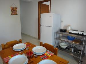 Kuchyňa alebo kuchynka v ubytovaní Amfi Apartments