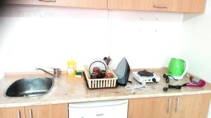 A kitchen or kitchenette at HILJADNIKOV Apartments