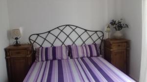 Postel nebo postele na pokoji v ubytování B&B Nerja + 13 fotografií