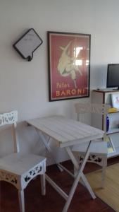 TV a/nebo společenská místnost v ubytování B&B Nerja