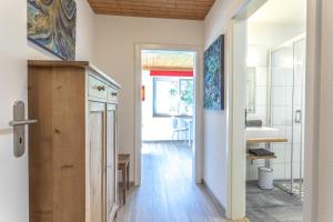 an open hallway with a bathroom and a sink at Apartment Hochpustertal in Heinfels +53 photos