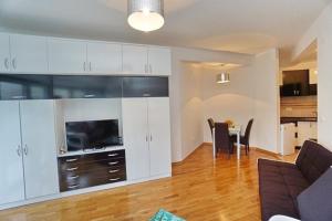 Kuchyň nebo kuchyňský kout v ubytování Anja Apartment + 18 fotografií