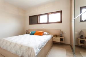 Ένα ή περισσότερα κρεβάτια σε δωμάτιο στο Renata apartment 2BR, near beach