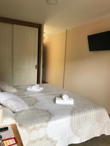 Ένα ή περισσότερα κρεβάτια σε δωμάτιο στο Alojamiento Rural Cosorios