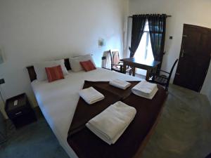 Postel nebo postele na pokoji v ubytování Luna Beach Hotel