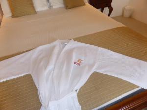 Кровать или кровати в номере Marigot Palms Luxury Caribbean Apartment Suites
