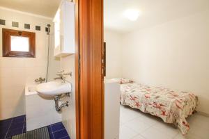 Koupelna v ubytování Lido Apartment