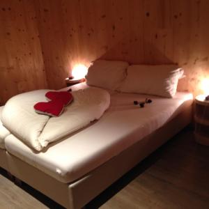Postel nebo postele na pokoji v ubytování Apartments Resi