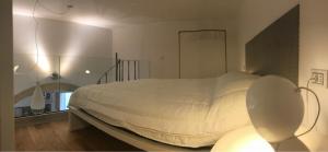 Ein Bett oder Betten in einem Zimmer der Unterkunft Area 2