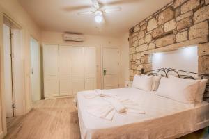 Postel nebo postele na pokoji v ubytování Bademli Konak Otel