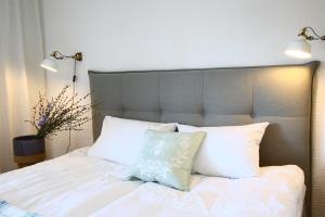 Posteľ alebo postele v izbe v ubytovaní Apartament Stary Port 1 + 14 fotografií