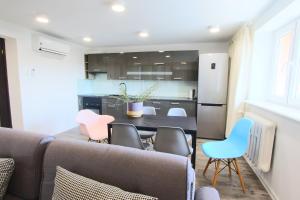 Kuchyňa alebo kuchynka v ubytovaní Apartament Stary Port 1