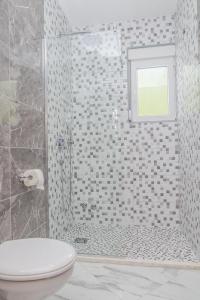 Vannituba majutusasutuses Kristal Apartmani