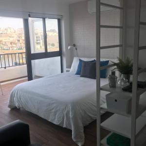 Ein Bett oder Betten in einem Zimmer der Unterkunft Sunrise Creek