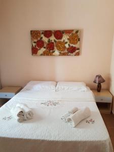 Ένα ή περισσότερα κρεβάτια σε δωμάτιο στο Bed and Breakfast da Gigi e Antonella