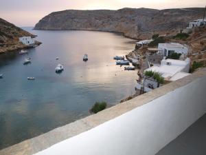 a view of a harbor with boats in the water at Kokagia House in Cherronisos
