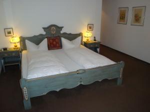 Postel nebo postele na pokoji v ubytování Hotel Haus Appelberg