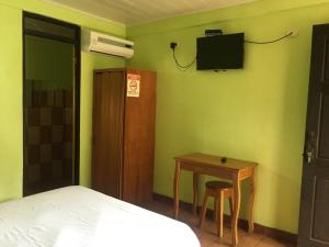 TV a/nebo společenská místnost v ubytování Cabinas Brisas del Golfo