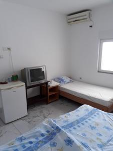 Postel nebo postele na pokoji v ubytování Guest House Sandra