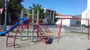 a playground with a slide and a ladder at Stone Guest House in Split